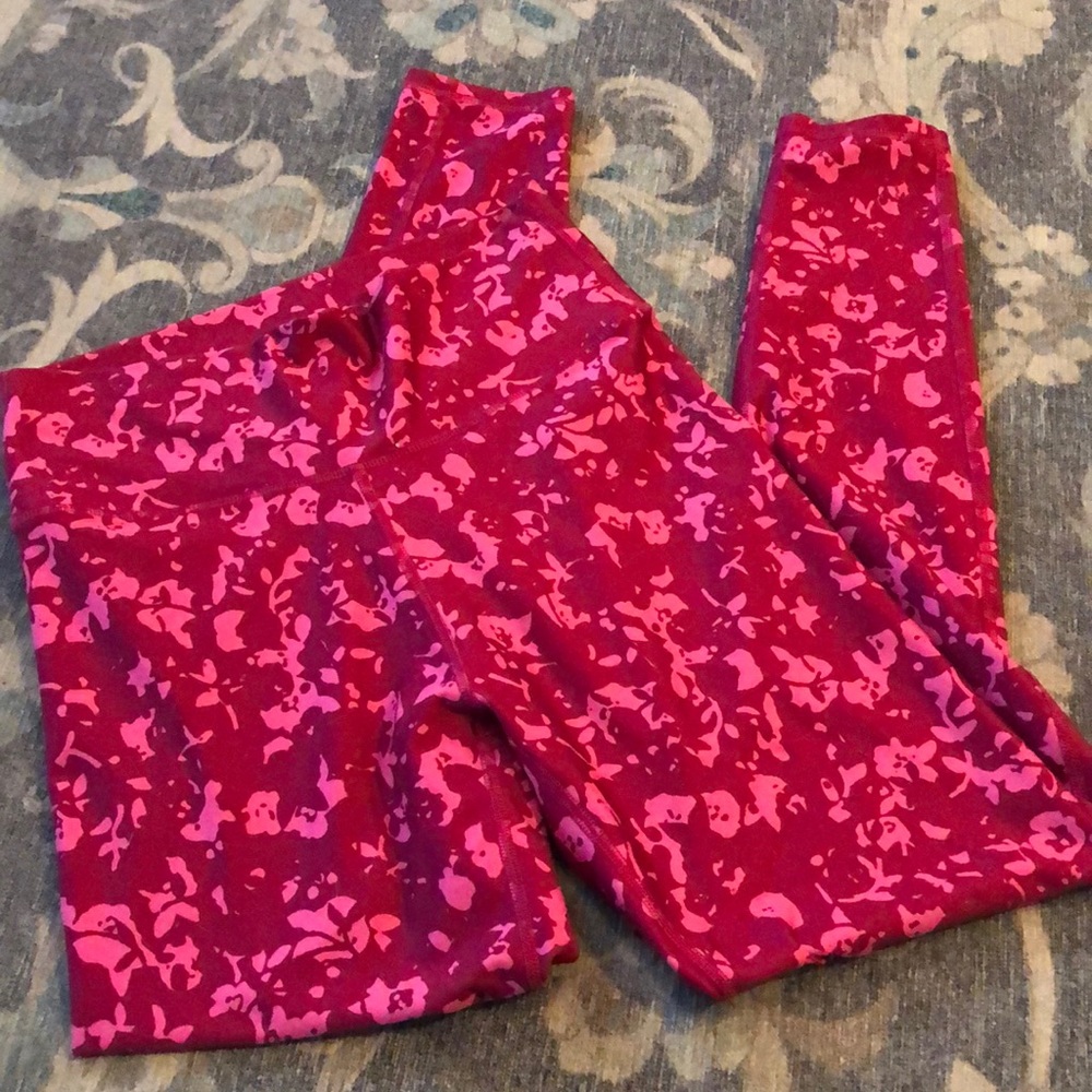 Fabletics high rise berry colored leggings.